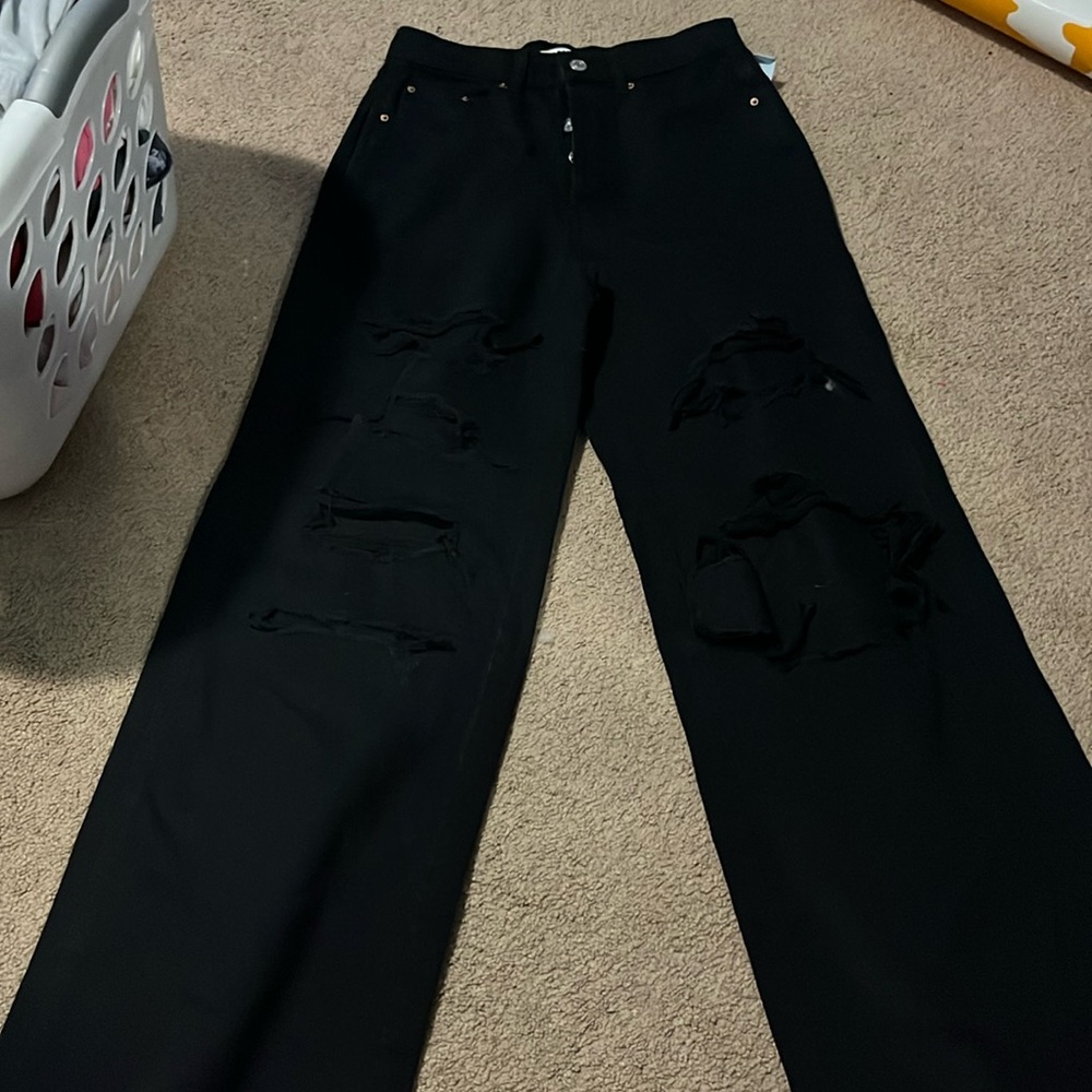 Black baggy PacSun jeans ripped with multiple buttons